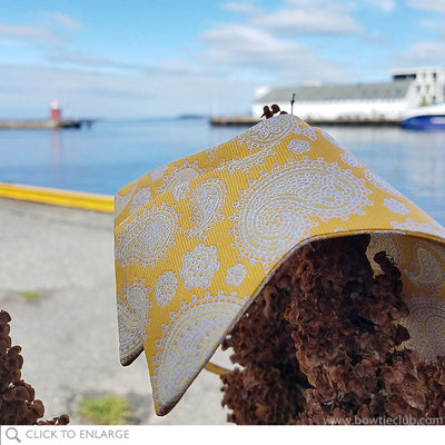 Yellow and White Silk paisley bow tie on dock in Alesund Norway