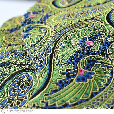 close up of green paisley bow tie