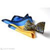 matching set pocket square and bow tie in yellow blue and navy