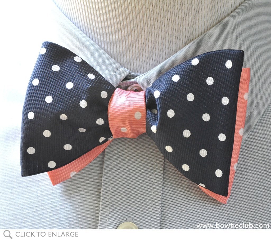 Pink and navy reversible dot bow tie